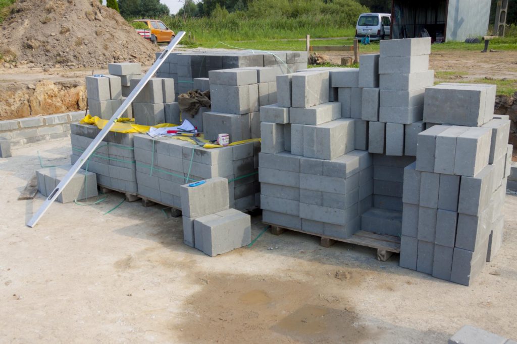 concrete bricks stacked ready for construction